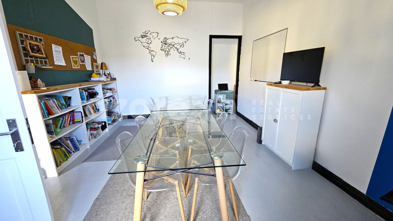 Large room with bookshelves